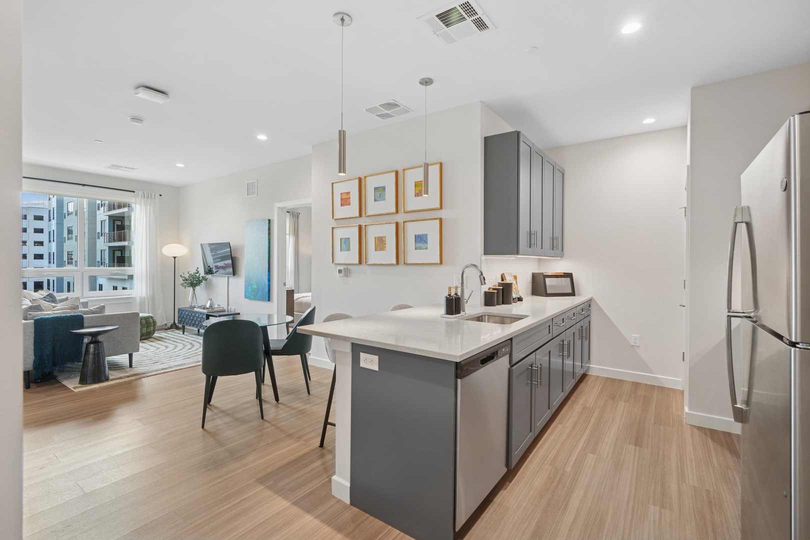 Kitchen & living room in one of Embark's luxury apartments in East Orange, NJ
