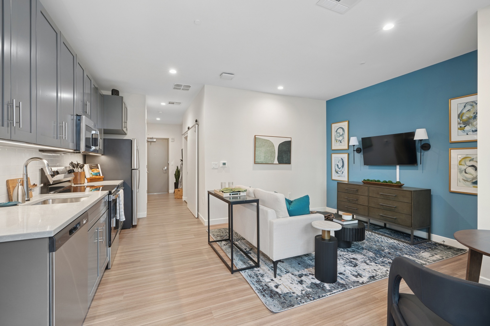 Kitchen & living room in one of Embark's luxury apartments in East Orange, NJ